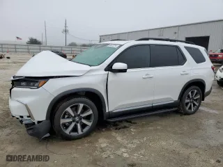 2025 Honda Pilot Touring with VIN 5FNYG1H71SB053557, listed as a Copart auction lot 86022254 with 1,970 mi miles and Salvage Title. Bid and sale history available at carsss.com. Image 1.