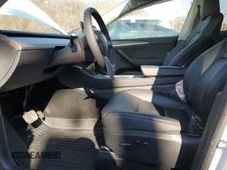 2023 Tesla Model Y Long Range z VIN 7SAYGDEE5PF785124, wystawiony jako Copart lot #47072345 z przebiegiem 31 341 mil mil oraz Szkoda całkowita • Salvage title. Historia ofert i sprzedaży dostępna na DreamBid. Obrazek 7.