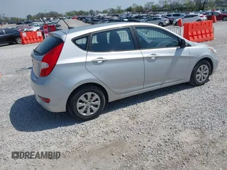 2016 Hyundai Accent SE with VIN KMHCT5AE5GU265720, listed as a IAAI auction lot 41985018 with 158,842 mi miles. Bid and sale history available at carsss.com. Image 4.