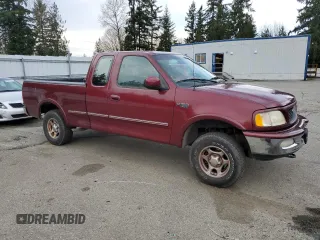 1997 Ford F-150 XL with VIN 1FTDX18W7VKC99428, listed as a Copart auction lot 45921715 with 158,791 mi miles and Salvage Title. Bid and sale history available at carsss.com. Image 4.