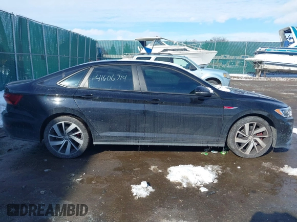 2019 Volkswagen Jetta GLI S z VIN 3VW6T7BU5KM240619, wystawiony jako IAAI lot #41606714 z przebiegiem 86 557 mil mil oraz . Historia ofert i sprzedaży dostępna na DreamBid. Obrazek 13.