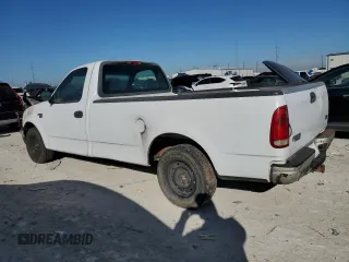 2000 Ford F-150 XL with VIN 1FTRF17W0YKA31819, listed as a Copart auction lot 85775044 with 214,945 mi miles and Clean title. Bid and sale history available at DreamBid. Image 2.