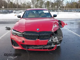 2022 BMW 3 Series M340i xDrive with VIN WBA5U9C01NFM09684, listed as a IAAI auction lot 41670169 with 38,640 mi miles and . Bid and sale history available at DreamBid. Image 12.