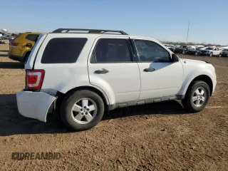 2009 Ford Escape XLS with VIN 1FMCU92729KD10213, listed as a Copart auction lot 48704425 with 114,219 mi miles and Salvage title. Bid and sale history available at DreamBid. Image 3.
