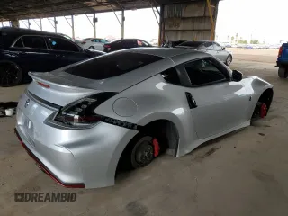 2015 Nissan 370Z Nismo z VIN JN1AZ4EH1FM441060, wystawiony jako Copart lot #53423725 z przebiegiem Nie podano mil oraz Szkody całkowita. Historia ofert i sprzedaży dostępna na DreamBid. Obrazek 3.