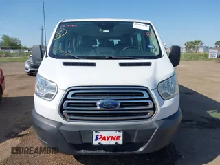 2019 Ford Transit Passenger XL z VIN 1FBZX2ZM8KKA75772, wystawiony jako IAAI lot #41990148 z przebiegiem 101 809 mil mil oraz . Historia ofert i sprzedaży dostępna na DreamBid. Obrazek 6.