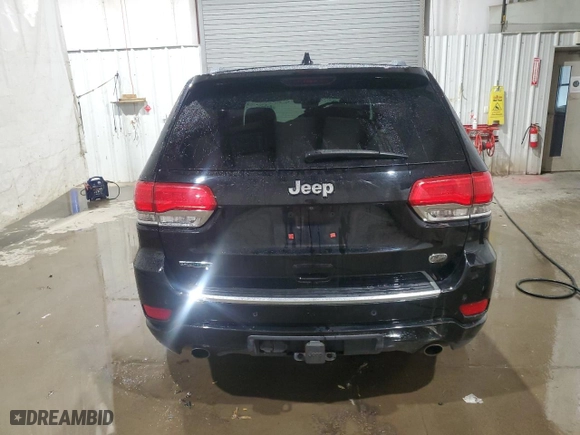 2014 Jeep Grand Cherokee Overland with VIN 1C4RJFCM2EC298661, listed as a Copart auction lot 81331004 with 245,716 mi miles and Salvage Title. Bid and sale history available at carsss.com. Image 6.