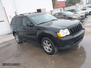2009 Jeep Grand Cherokee Laredo with VIN 1J8GS48K39C549136, listed as a IAAI auction lot 41446925 with 162,639 mi miles. Bid and sale history available at carsss.com. Image 1.