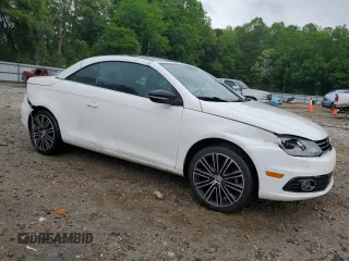 2013 Volkswagen Eos Komfort with VIN WVWBW8AH0DV003581, listed as a Copart auction lot 54498655 with 95,203 mi miles and Salvage Title. Bid and sale history available at DreamBid. Image 4.