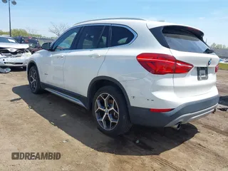 2018 BMW X1 xDrive28i with VIN WBXHT3C39J5F91912, listed as a IAAI auction lot 42099647 with 79,023 mi miles and . Bid and sale history available at DreamBid. Image 3.