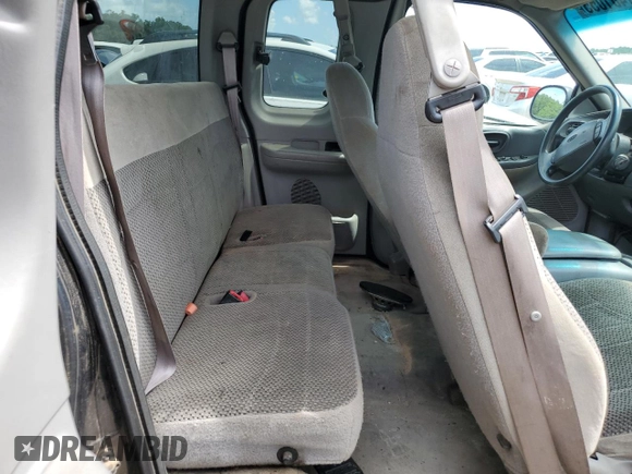 1999 Ford F-150 with VIN 1FTZX1720XKA84187, listed as a Copart auction lot 61401055 with Not provided miles and Salvage title. Bid and sale history available at DreamBid. Image 10.
