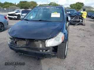 2008 Suzuki SX4 Convenience Pkg with VIN JS2YC415985102350, listed as a IAAI auction lot 41626643 with 210,929 mi miles. Bid and sale history available at carsss.com. Image 6.
