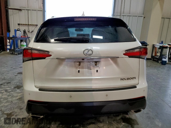 2015 Lexus NX 200t with VIN JTJYARBZ2F2002567, listed as a Copart auction lot 60667465 with 133,023 mi miles and Salvage title. Bid and sale history available at DreamBid. Image 6.