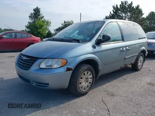 2005 Chrysler Town & Country with VIN 1C4GP45R35B326475, listed as a IAAI auction lot 40670759 with 199,230 mi miles. Bid and sale history available at carsss.com. Image 2.