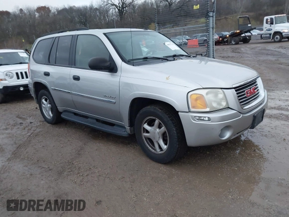 2006 GMC Envoy SLT with VIN 1GKDT13SX62342147, listed as a IAAI auction lot 40873738 with 159,092 mi miles. Bid and sale history available at carsss.com. Image 1.