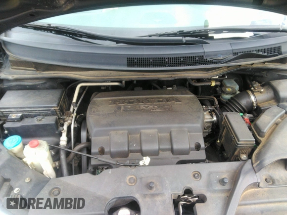 2012 Honda Odyssey Touring with VIN 5FNRL5H97CB066596, listed as a IAAI auction lot 42472935 with 217,182 mi miles and . Bid and sale history available at DreamBid. Image 10.