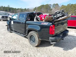 2022 Chevrolet Colorado 4WD Z71 with VIN 1GCGTDENXN1165279, listed as a IAAI auction lot 39042352 with Not provided miles and . Bid and sale history available at DreamBid. Image 3.