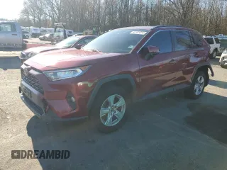 2019 Toyota RAV4 XLE with VIN JTMP1RFV2KD039171, listed as a Copart auction lot 82153374 with 64,482 mi miles and Salvage Title. Bid and sale history available at carsss.com. Image 1.