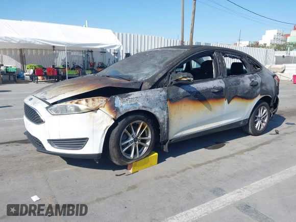 2017 Ford Focus SE with VIN 1FADP3F25HL221763, listed as a IAAI auction lot 41995746 with 101,369 mi miles and . Bid and sale history available at DreamBid. Image 2.