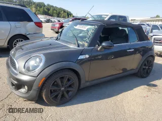2014 MINI Convertible S with VIN WMWZP3C52ET706661, listed as a Copart auction lot 70040934 with 65,484 mi miles and Salvage Title. Bid and sale history available at DreamBid. Image 1.