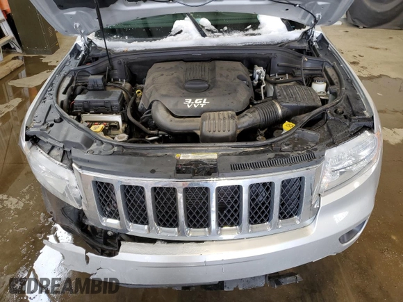 2013 Jeep Grand Cherokee Overland with VIN 1C4RJFCG2DC622345, listed as a Copart auction lot 49640325 with 192,144 mi miles and Salvage Title. Bid and sale history available at carsss.com. Image 12.