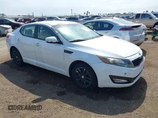 2013 Kia Optima LX with VIN 5XXGM4A76DG156327, listed as a IAAI auction lot 42036427 with 137,129 mi miles. Bid and sale history available at carsss.com. Image 1.