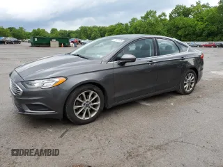 2017 Ford Fusion SE z VIN 3FA6P0H70HR415179, wystawiony jako Copart lot #57429175 z przebiegiem 59 499 mil mil oraz Szkody całkowita. Historia ofert i sprzedaży dostępna na DreamBid. Obrazek 1.