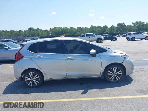 2015 Honda Fit EX-L z VIN 3HGGK5H82FM727678, wystawiony jako IAAI lot #42451860 z przebiegiem 102 512 mil mil oraz . Historia ofert i sprzedaży dostępna na DreamBid. Obrazek 13.