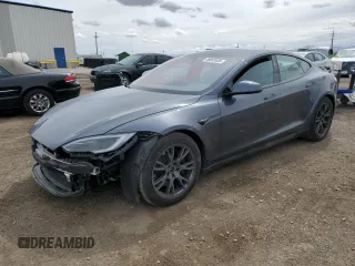 2023 Tesla Model S с VIN 5YJSA1E58PF519308, выставлен на аукционе Copart как лот 49002635 с пробегом 12 942 миль миль и Списание • Salvage title. История ставок и продаж доступна на DreamBid. Изображение 1.