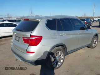 2016 BMW X3 xDrive28i with VIN 5UXWX9C52G0D89088, listed as a IAAI auction lot 41759386 with 143,249 mi miles and . Bid and sale history available at DreamBid. Image 4.