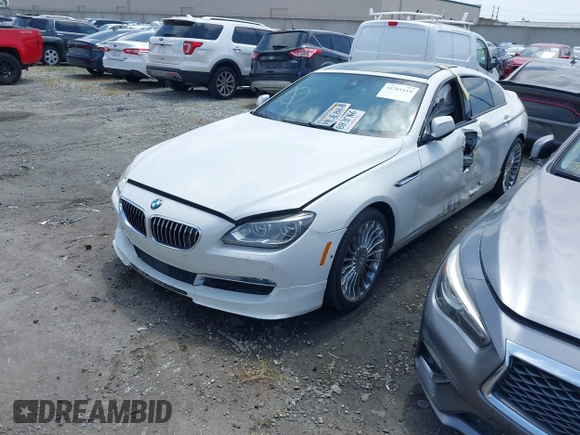 2015 BMW 6 Series 650i xDrive with VIN WBA6B4C53FD899938, listed as a IAAI auction lot 41761114 with 93,015 mi miles and . Bid and sale history available at carsss.com. Image 17.