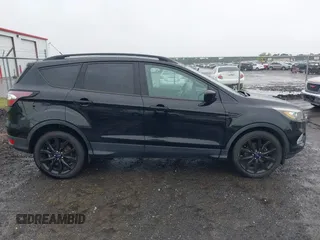 2017 Ford Escape SE with VIN 1FMCU0GD3HUD07141, listed as a IAAI auction lot 42250771 with 116,086 mi miles and . Bid and sale history available at DreamBid. Image 14.