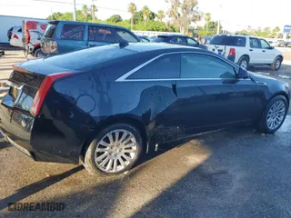 2012 Cadillac CTS Coupe with VIN 1G6DA1E32C0156751, listed as a Copart auction lot 61639424 with 138,654 mi miles and Salvage Title. Bid and sale history available at carsss.com. Image 3.