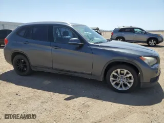 2014 BMW X1 xDrive28i with VIN WBAVL1C51EVY20752, listed as a Copart auction lot 52236685 with 130,956 mi miles and Clean Title. Bid and sale history available at carsss.com. Image 4.