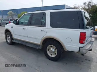 1999 Ford Expedition XLT z VIN 1FMPU18L0XLA32023, wystawiony jako IAAI lot #41976697 z przebiegiem Nie podano mil oraz . Historia ofert i sprzedaży dostępna na DreamBid. Obrazek 3.