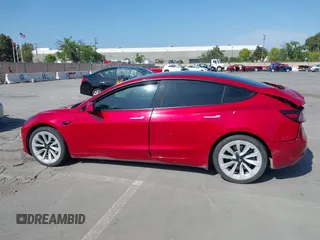 2021 Tesla Model 3 Long Range with VIN 5YJ3E1EB4MF936743, listed as a IAAI auction lot 42154322 with 46,983 mi miles and . Bid and sale history available at DreamBid. Image 14.