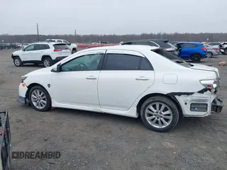 2011 Toyota Corolla L with VIN 2T1BU4EE8BC681039, listed as a IAAI auction lot 41798321 with 195,583 mi miles. Bid and sale history available at carsss.com. Image 14.