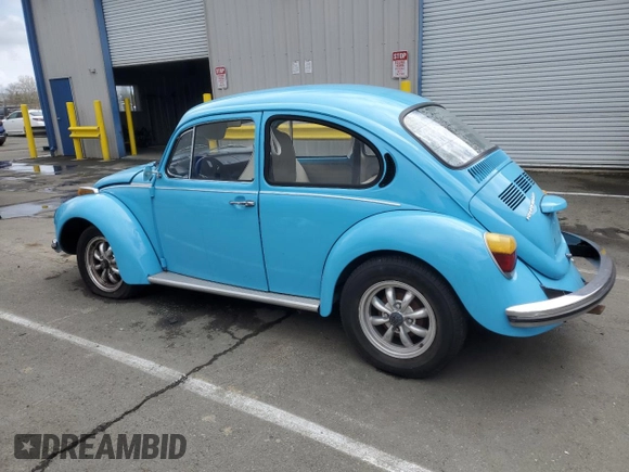 1973 Volkswagen Beetle with VIN 1332519606, listed as a Copart auction lot 50725285 with 45,149 mi miles and Salvage Title. Bid and sale history available at DreamBid. Image 2.