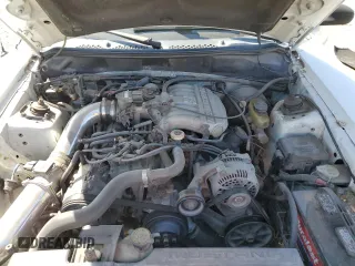 1995 Ford Mustang z VIN 1FALP4043SF252513, wystawiony jako Copart lot #52131605 z przebiegiem 237 066 mil mil oraz Szkoda całkowita • Salvage title. Historia ofert i sprzedaży dostępna na DreamBid. Obrazek 13.
