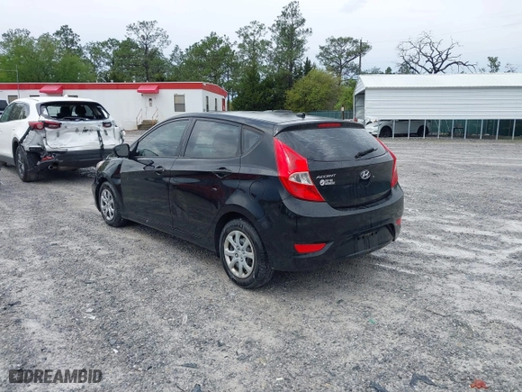 2014 Hyundai Accent GS with VIN KMHCT5AE7EU164658, listed as a IAAI auction lot 41911092 with 132,442 mi miles. Bid and sale history available at carsss.com. Image 3.
