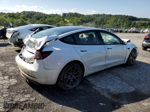 2023 Tesla Model 3 with VIN 5YJ3E1EA5PF567354, listed as a Copart auction lot 60964725 with 60,962 mi miles and Salvage title. Bid and sale history available at DreamBid. Image 3.