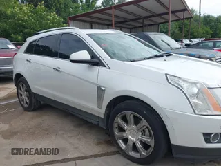 2013 Cadillac SRX Performance Collection z VIN 3GYFNDE38DS542736, wystawiony jako IAAI lot #42398648 z przebiegiem 266 059 mil mil oraz . Historia ofert i sprzedaży dostępna na DreamBid. Obrazek 13.