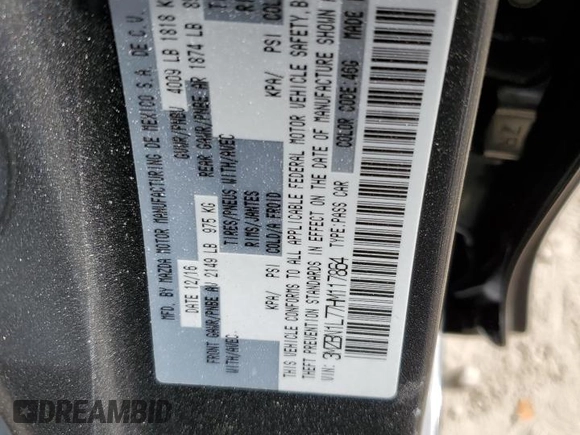 2017 Mazda 3 Touring with VIN 3MZBN1L77HM117864, listed as a Copart auction lot 51895385 with 63,076 mi miles and Salvage Title. Bid and sale history available at carsss.com. Image 12.
