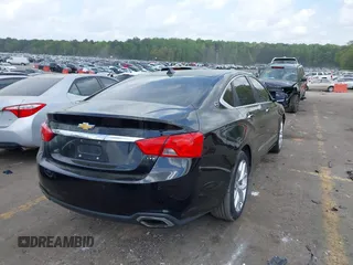 2014 Chevrolet Impala LTZ with VIN 1G1155S32EU155880, listed as a IAAI auction lot 41964572 with 184,992 mi miles and . Bid and sale history available at DreamBid. Image 4.