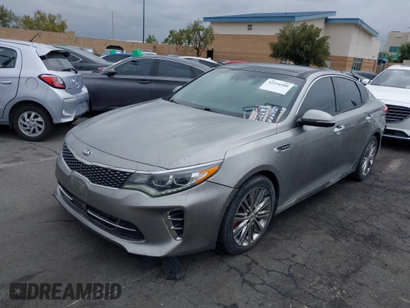 2017 Kia Optima SX Limited z VIN 5XXGV4L20HG169787, wystawiony jako IAAI lot #42194580 z przebiegiem 89 035 mil mil oraz . Historia ofert i sprzedaży dostępna na DreamBid. Obrazek 20.