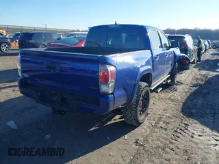 2023 Toyota Tacoma 4WD SR with VIN 3TMCZ5AN9PM559919, listed as a IAAI auction lot 41855044 with 46,153 mi miles. Bid and sale history available at carsss.com. Image 4.