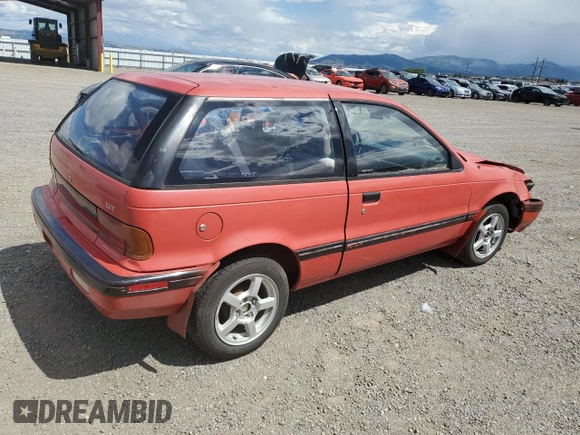 1989 Plymouth Colt GT z VIN JP3CU34X7KU085019, wystawiony jako Copart lot #61891764 z przebiegiem 188 465 mil mil oraz Czysty tytuł • Clean title. Historia ofert i sprzedaży dostępna na DreamBid. Obrazek 3.