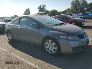 2010 Honda Civic Cpe LX with VIN 2HGFG1B61AH529839, listed as a Copart auction lot 69501724 with 218,443 mi miles and Salvage Title. Bid and sale history available at carsss.com. Image 4.
