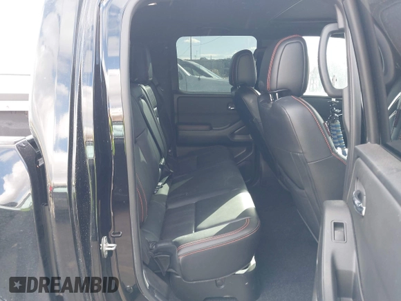 2023 Nissan Frontier SV with VIN 1N6ED1EK0PN658048, listed as a IAAI auction lot 41383407 with 13,744 mi miles and . Bid and sale history available at DreamBid. Image 8.