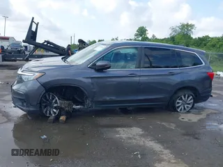 2019 Honda Pilot EX-L with VIN 5FNYF5H52KB039336, listed as a IAAI auction lot 42108456 with 220,307 mi miles and . Bid and sale history available at carsss.com. Image 14.